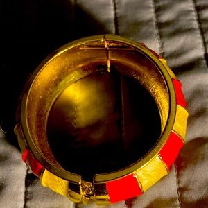 Beautiful brand new bracelet.  Enamel gold and cranberry